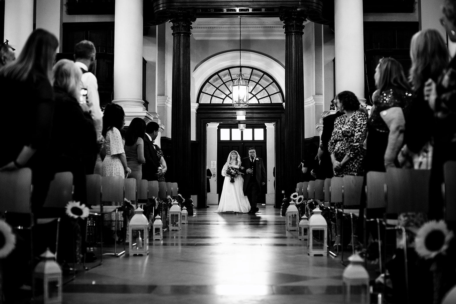 Bride-walking-down-the-aisle-with-her-dad