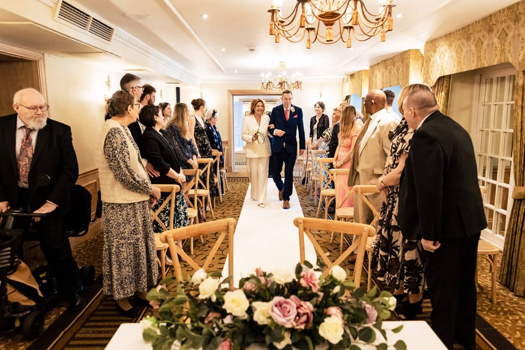 bride and groom walking down the aisle