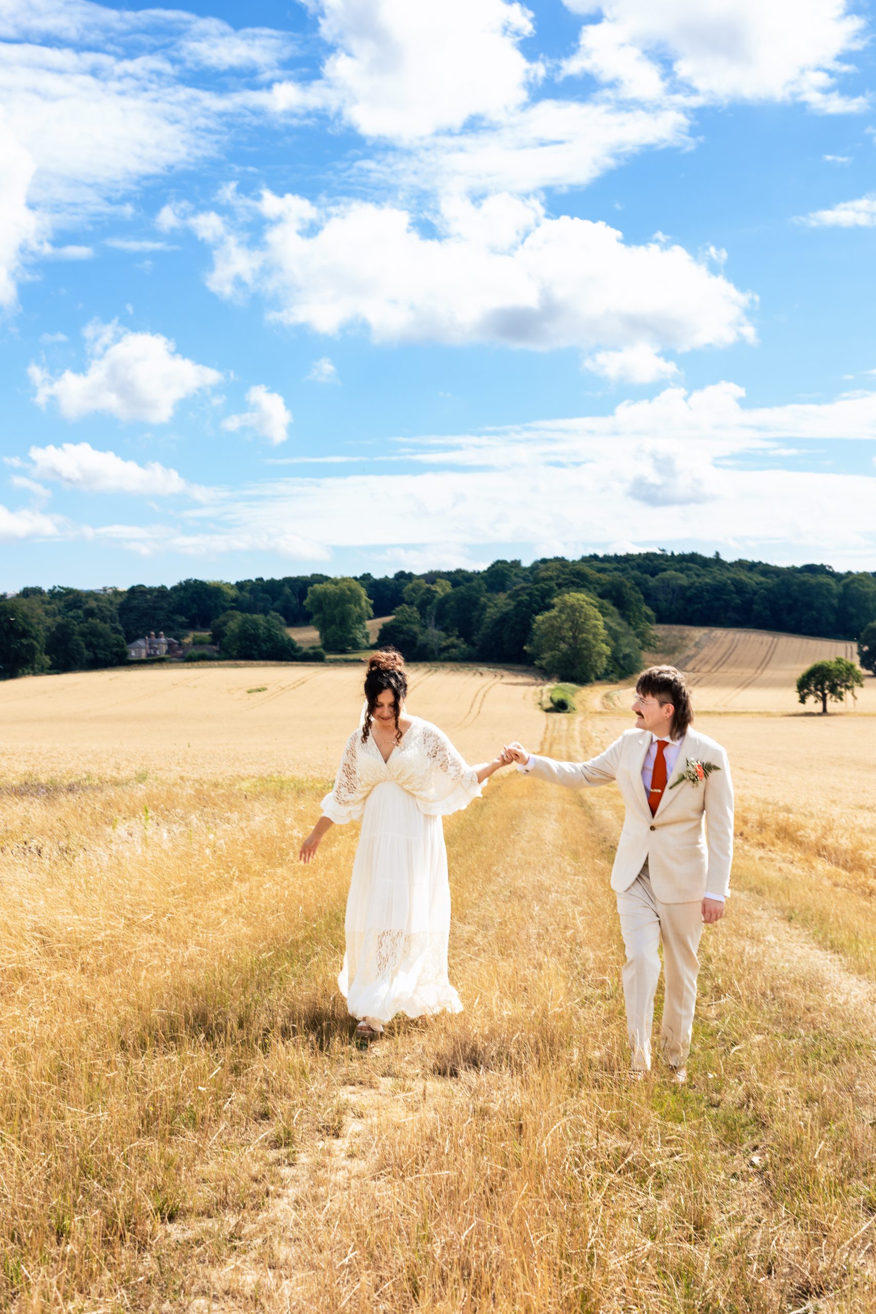 Bride and groom couple portraits in Fitzleroi Barn